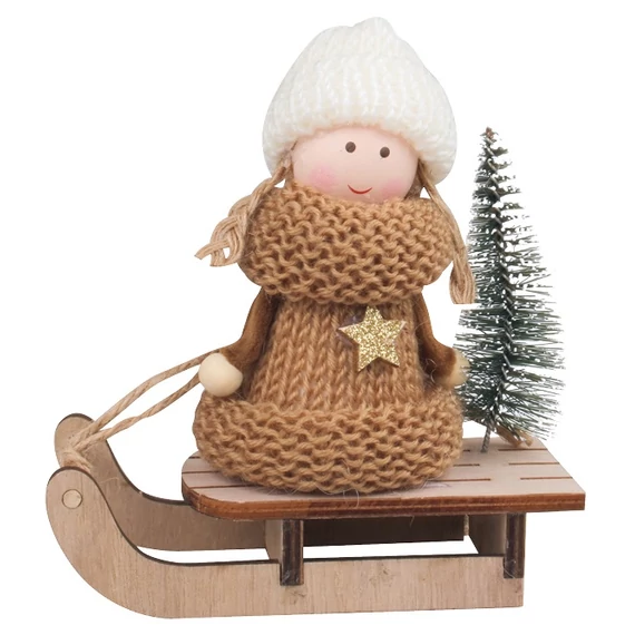 Kislány szánkón mézszínű pulóverben 14 cm